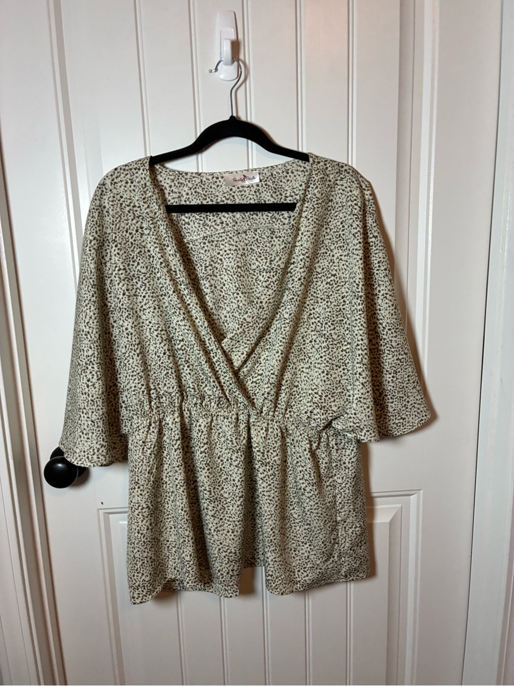Wrap-Front Speckled Cream Peplum Tunic